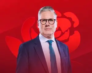 Kier Starmer on a Labour background